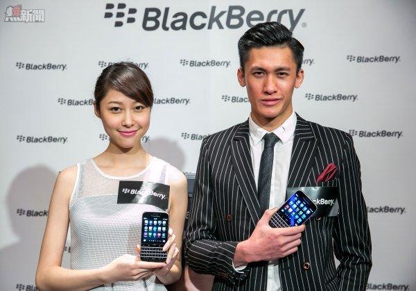 Models holding BlackBerry Classic 1